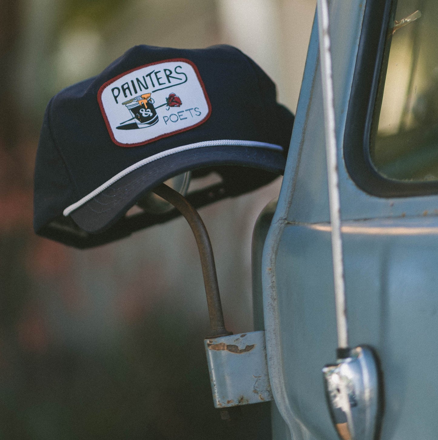 The "Sidewalk Artist" hat