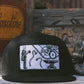 Black trucker hat with white patch